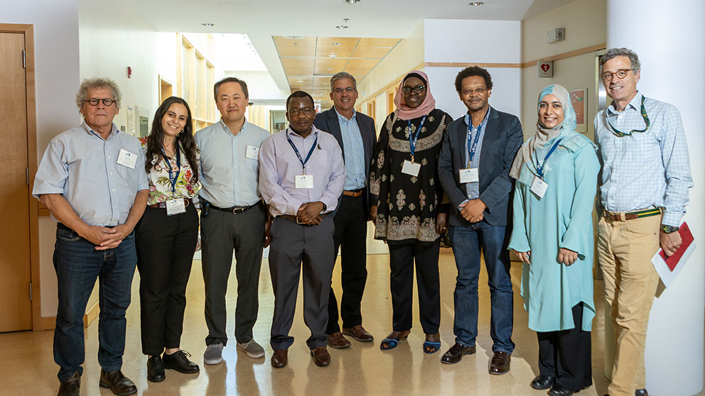 (l to r) David Valle, Professor, McKusick-Nathans Department of Genetic Medicine, The Johns Hopkins School of Medicine; Ghada El Kamah, MD, PhD Human Genetics and Genome Research Institute, National Research Centre, Cairo, Charles Lee, Ph.D., FACMG, Scientific Director and Professor, The Jackson Laboratory for Genomic Medicine, Robert Alvine Family Endowed Chair; Dr Collett Dandara, PhD, Division of Human Genetics, University of Cape Town; Lon Cardon, Ph.D., FMedSci, President and CEO, The Jackson Laboratory; Rokhaya Ndiaye, PhD, Département de Pharmacie, UCAD, Sénégal; Ambroise Wonkam, Professor of Genetic Medicine, and Director of the McKusick-Nathans Institute, and Department of Genetic Medicine, Johns Hopkins University School of Medicine, Baltimore; Dr Shahida Moosa, MbChB, PhD, Division of Molecular Biology and Human Genetics, Faculty of Medicine and Health Sciences, Stellenbosch University; Charlie Wray, Ph.D., Vice President for Education, The Jackson Laboratory.