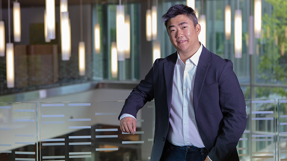 The Jackson Laboratory's Eric Wang standing in the JAX Genomic Medicine campus in Farmington, Conn.