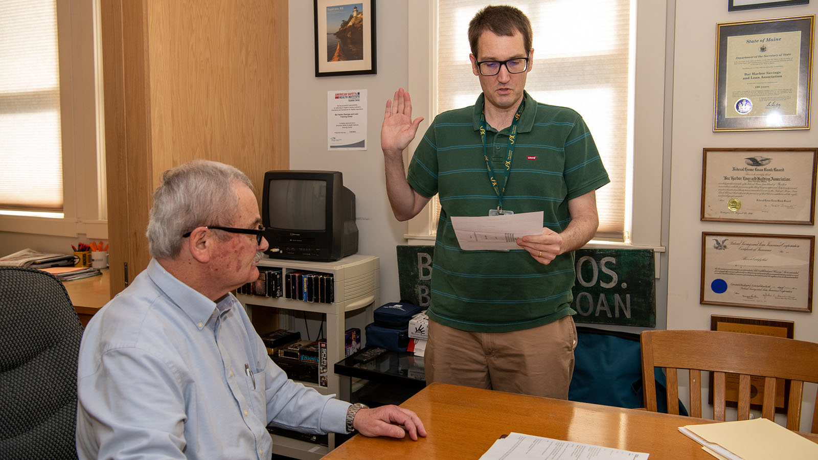 JAX employee Jason Bubier being sworn in. Dedimus Justice duties were performed by Bill Weir, president and CEO, Bar Harbor Savings and Loan.